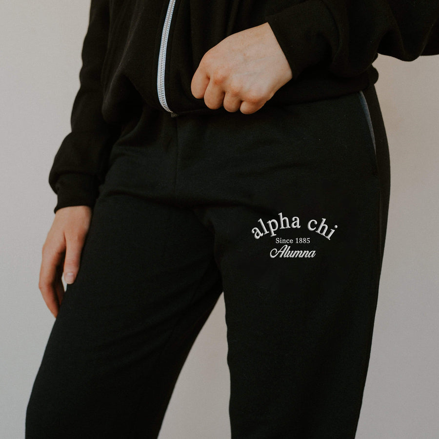 embroidery sorority black joggers with script text