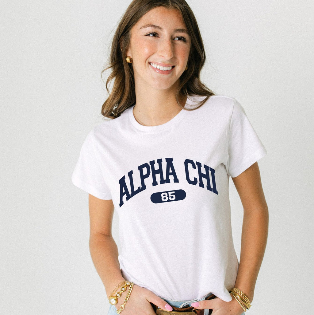 Ali & Ariel White collegiate sports baby tee